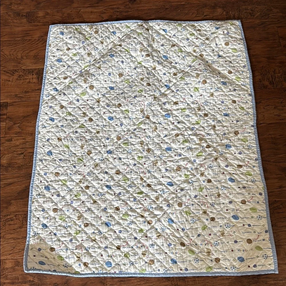 Varsity Baby Quilt with Red and Yellow Accents. Home quilted